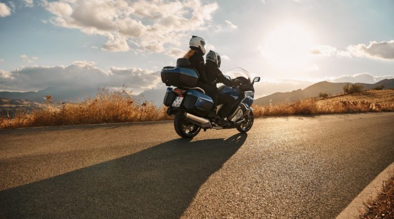 Two riders on a BMW motorcycle